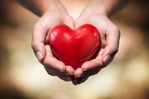 heart in hands giving